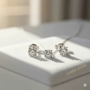 A matching fine jewelry set featuring the 18k white gold stud earrings and a complementing solitaire pendant necklace.