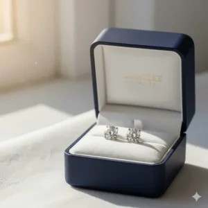 Beautiful branded luxury jewelry box containing the 18k white gold stud earrings, ready to be gifted.