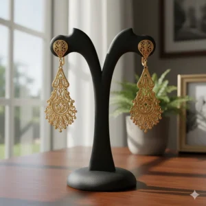 Intricate new dangle 24k gold earrings design showcasing pure yellow gold.