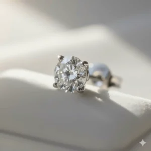 Close-up of the magnificent round solitaire diamond in the 18k white gold stud earring, showcasing the brilliant clarity.