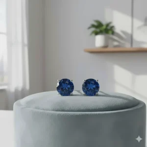 Beautiful gemstone 18k white gold stud earrings with a four-prong setting.