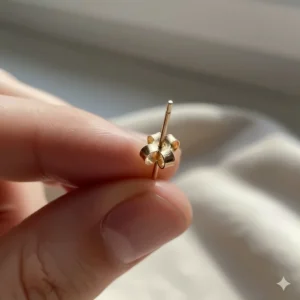 View showing the secure butterfly backs and high-quality construction of the 14k gold studs.