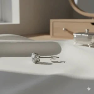 Side profile view of the secure 14K white gold basket setting holding the diamond stud.