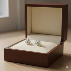 The stunning 14k gold diamond stud earrings presented in a sleek, luxurious gift box, ideal for a special occasion.