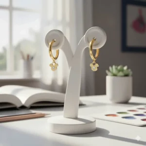 Small, stylish Disney 14k gold hoop earrings for older girls, featuring subtle character details.