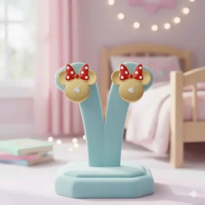 Vibrant enameled detail on 14k gold Disney earrings, providing a pop of color to the studs for girls.