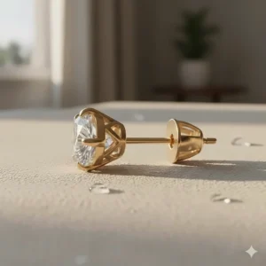 A profile view of the 14k gold diamond stud earrings showing the height and craftsmanship of the basket setting.