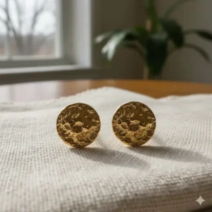 Round style 14k yellow gold nugget earrings, offering a classic and bold statement.