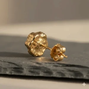 Image of the back of the earring, showcasing the secure post and butterfly clasp for these 10k gold nugget studs.