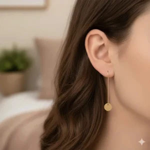 10 karat gold earrings featuring a sparkly cubic zirconia stone, offering affordable luxury.