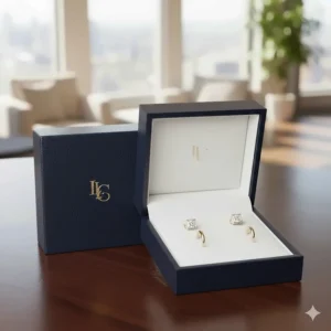 The elegant presentation box and packaging for the gold stud earrings, emphasizing quality and gifting appeal.