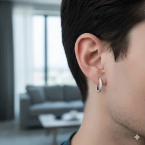 Stylish men's small hinged hoop earring in 18k white gold, featuring a row of pavé set diamonds.