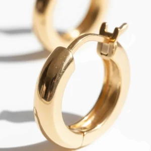 High-shine, polished finish on the durable 10 karat gold hoop earrings.